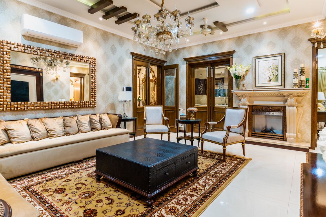 Elegant residential living room with a chandelier and classic furniture